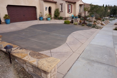 Stone Retaining wall and Stamped Concrete Driveway	 in Newbury Park