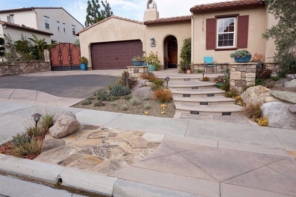 Sidewalk Features with stamped concrete and stone