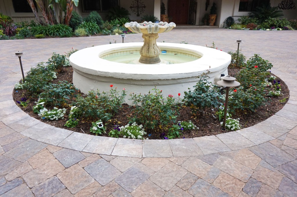 Paver Driveway with Custom Concrete Water Feature Paver Driveway with Custom Concrete Water Feature